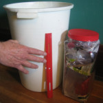 1 wk's trash in red lid jar Click to enlarge.